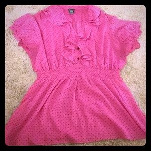 Pink shirt with black polka dots